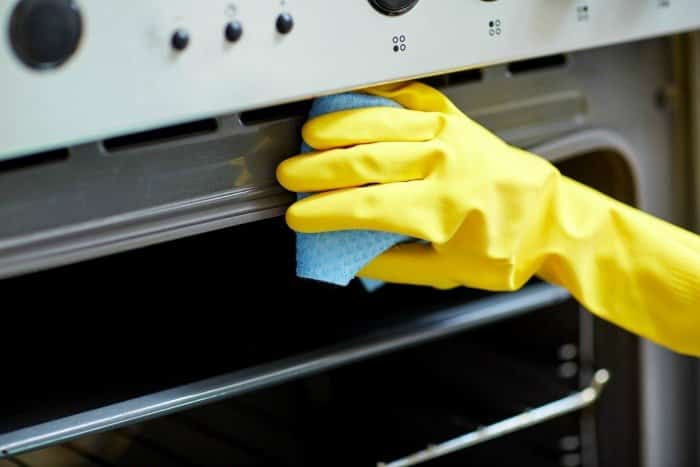 cleaning-the-stove-when-deep-clean-a-kitchen-